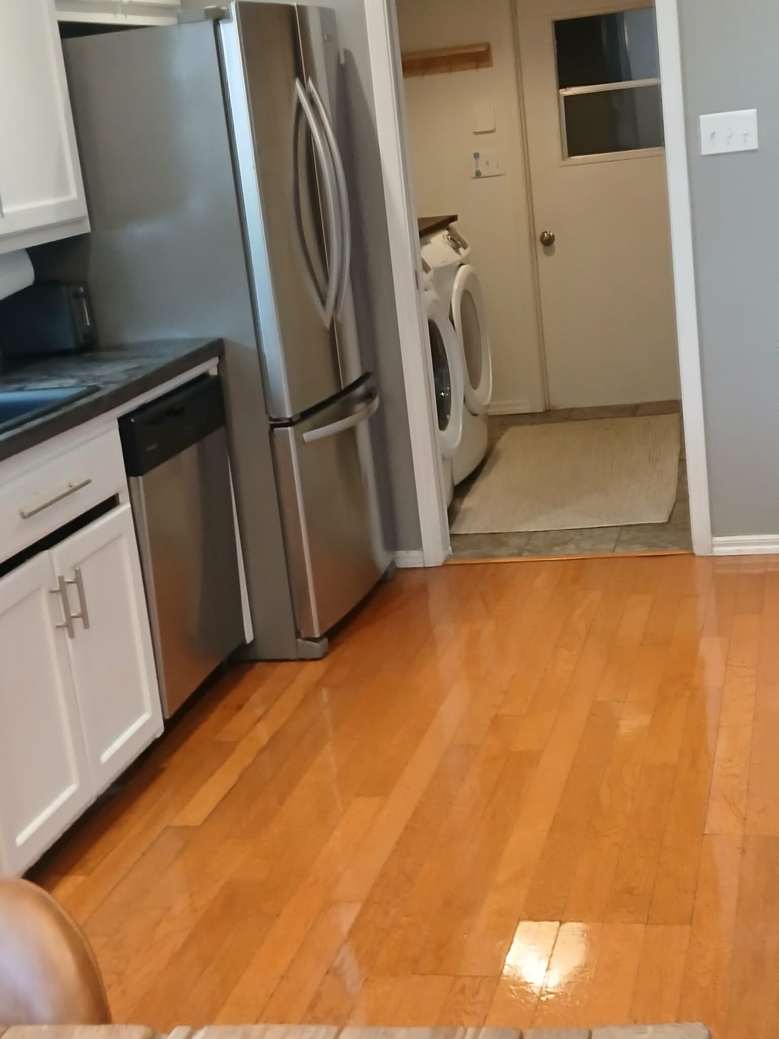 Clean kitchen with stainless steel appliances