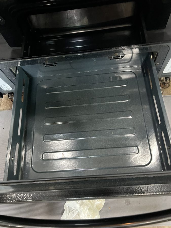 Inside of an oven cleaned by Wayman and Shannon